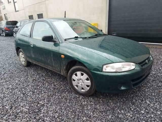 Groen Gebruikt 1998 Mitsubishi Colt Sedan | € 699 - Afbeelding 1/4