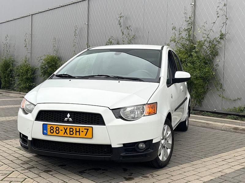 Wit Gebruikt 2012 Mitsubishi Colt Edition Hatchback | € 4.850 - Afbeelding 1/4