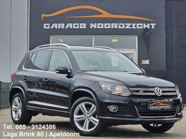 Zwart Gebruikt 2014 VW Tiguan R-line Edition SUV | € 14.445 (Eerlijke prijs) - Afbeelding 1/4