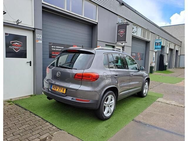 Grijs Gebruikt 2014 VW Tiguan Sport SUV | € 10.999 (Goede deal) - Afbeelding 1/4