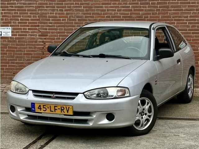 Grijs Gebruikt 2003 Mitsubishi Colt Hatchback | € 1.650 - Afbeelding 1/4