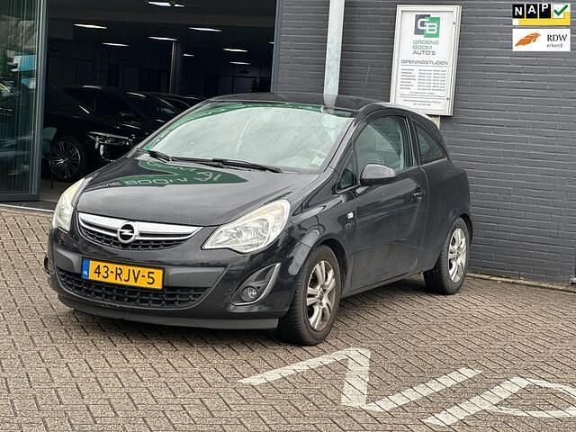 Zwart Gebruikt 2011 Opel Corsa Cosmo Hatchback | € 999 (Goede deal) - Afbeelding 1/4