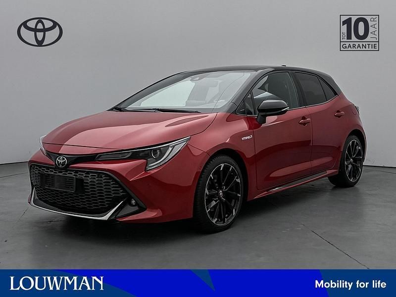 Rood, metallic lak Gebruikt 2021 Toyota Corolla Sport Hatchback | € 24.950 (Eerlijke prijs) - Afbeelding 1/3