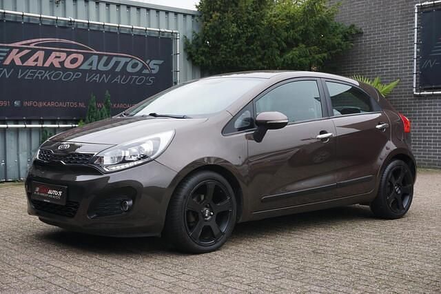 Bruin Gebruikt 2011 Kia Rio Hatchback | € 2.950 (Goede deal) - Afbeelding 1/4