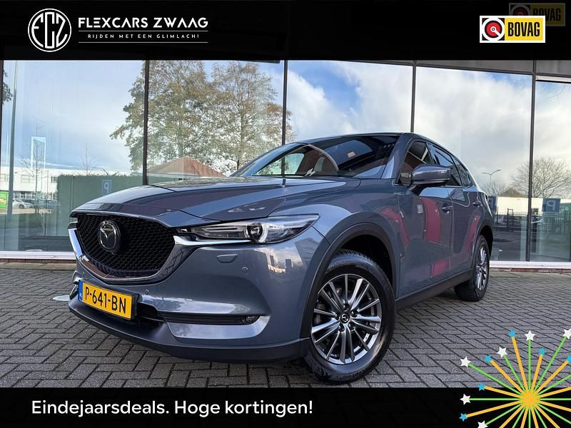 Grijs (metallic) Gebruikt 2021 Mazda CX-5 Signature SUV | € 31.945 (Iets duurder) - Afbeelding 1/4