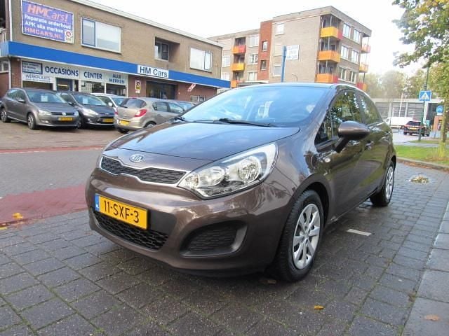 Bruin Gebruikt 2011 Kia Rio Hatchback | € 5.450 (Eerlijke prijs) - Afbeelding 1/4