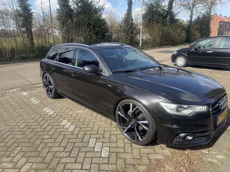 Zwart Gebruikt 2013 Audi A6 Stationwagen | € 12.500 (Duur) - Afbeelding 1/4