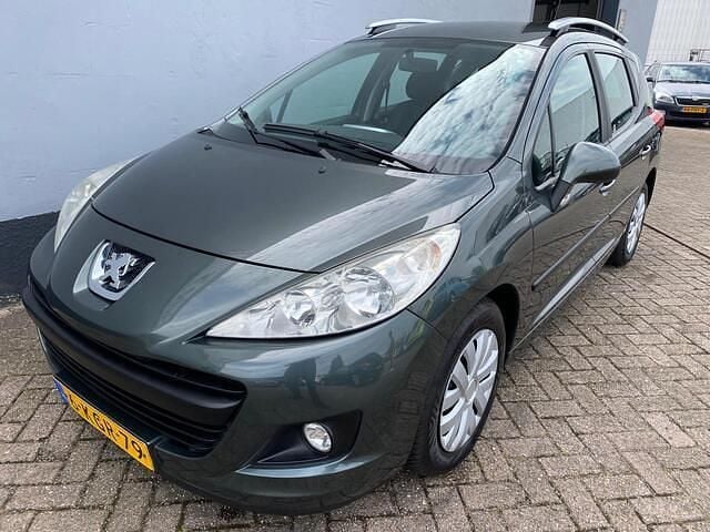 Grijs Gebruikt 2011 Peugeot 207 Sportium Stationwagen | € 2.950 (Eerlijke prijs) - Afbeelding 1/4