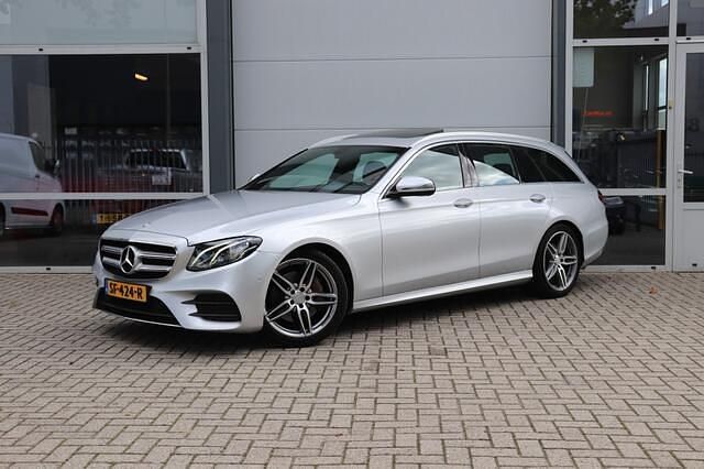 Grijs Gebruikt 2017 Mercedes E220 Business Stationwagen | € 20.950 (Goede deal) - Afbeelding 1/4