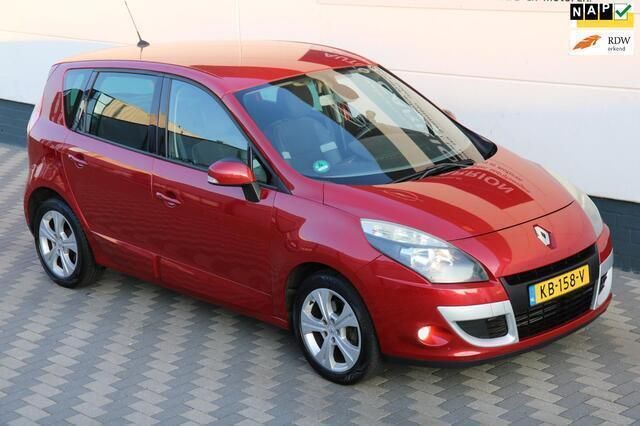 Rood, metallic lak Gebruikt 2011 Renault Scénic III Dynamique MPV | € 3.995 (Eerlijke prijs) - Afbeelding 1/4