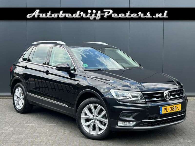 Zwart Gebruikt 2016 VW Tiguan Highline SUV | € 21.950 (Eerlijke prijs) - Afbeelding 1/4