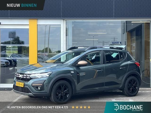 Groen, metallic lak Gebruikt 2023 Dacia Sandero Extreme Hatchback | € 23.350 (Iets duurder) - Afbeelding 1/4