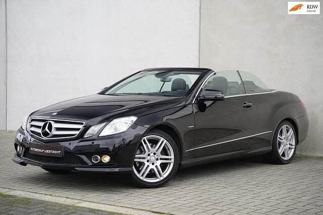 Zwart Gebruikt 2010 Mercedes E200 Avantgarde Cabriolet | € 13.950 (Goede deal) - Afbeelding 1/4