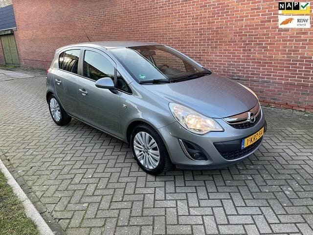 Grijs Occasion 2013 Opel Corsa Design Edition Hatchback | € 3.450 (Goede deal) - Afbeelding 1/4