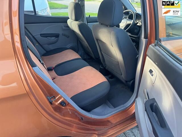 Oranje Gebruikt 2004 Kia Picanto LX Hatchback | € 950 (Eerlijke prijs) - Afbeelding 1/4