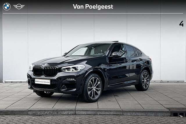 Saphirschwarz metallic (zwart metallic) Gebruikt 2021 BMW X4 Executive SUV | € 46.900 (Goede deal) - Afbeelding 1/4