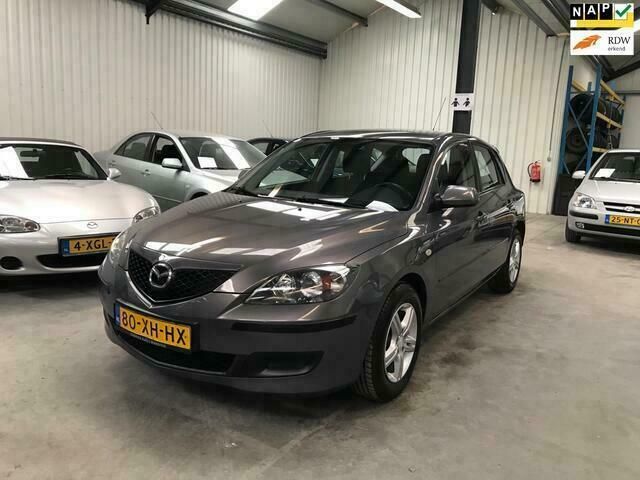 Grijs Gebruikt 2007 Mazda 3 Touring Hatchback | € 4.450 (Iets duurder) - Afbeelding 1/4
