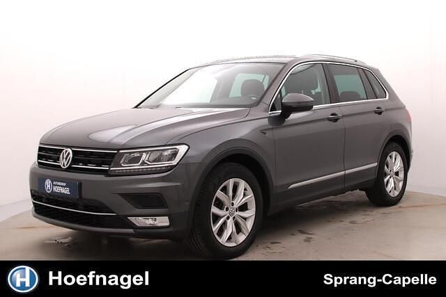 Grijs (metallic) Gebruikt 2017 VW Tiguan Highline SUV | € 21.950 (Goede deal) - Afbeelding 1/3