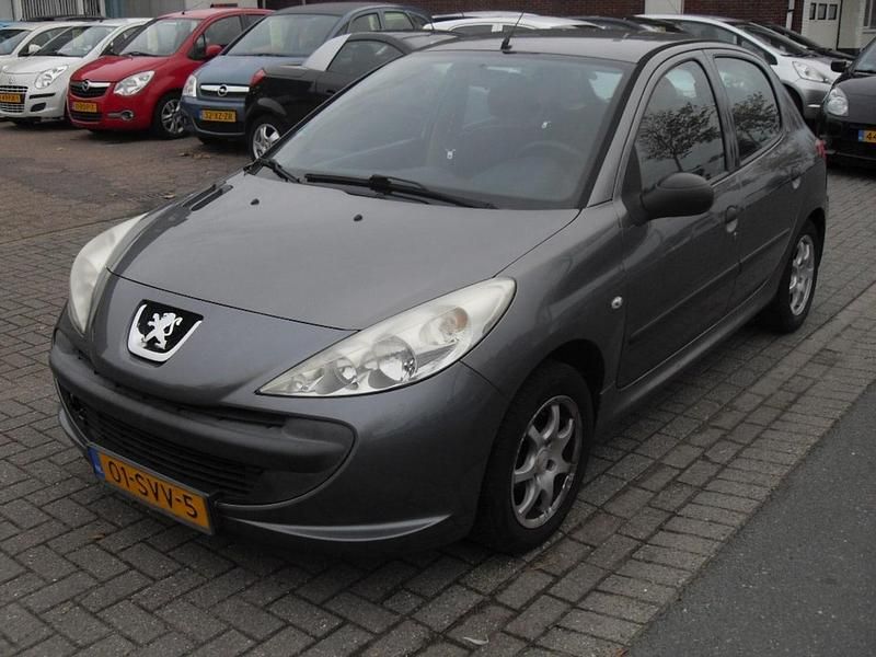 Grijs (metallic) Gebruikt 2011 Peugeot 206 Hatchback | € 1.650 (Goede deal) - Afbeelding 1/4