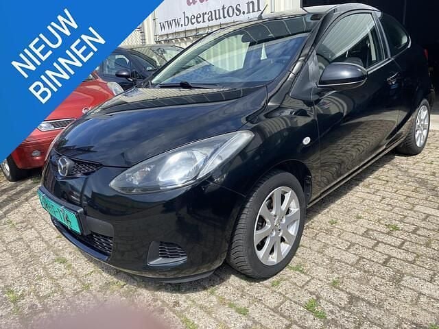 Zwart Gebruikt 2009 Mazda 2 Exclusive Hatchback | € 2.250 (Goede deal) - Afbeelding 1/4