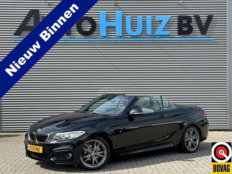 Zwart, metallic lak Gebruikt 2018 BMW 218 Executive Cabriolet | € 21.990 (Eerlijke prijs) - Afbeelding 1/4