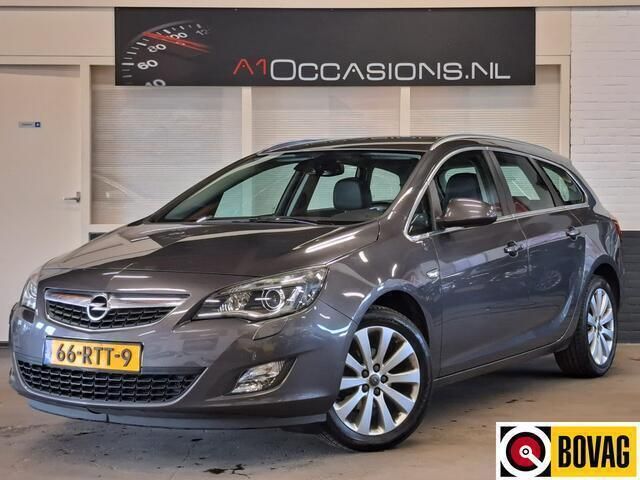 Grijs Gebruikt 2011 Opel Astra Cosmo Stationwagen | € 6.495 (Eerlijke prijs) - Afbeelding 1/4