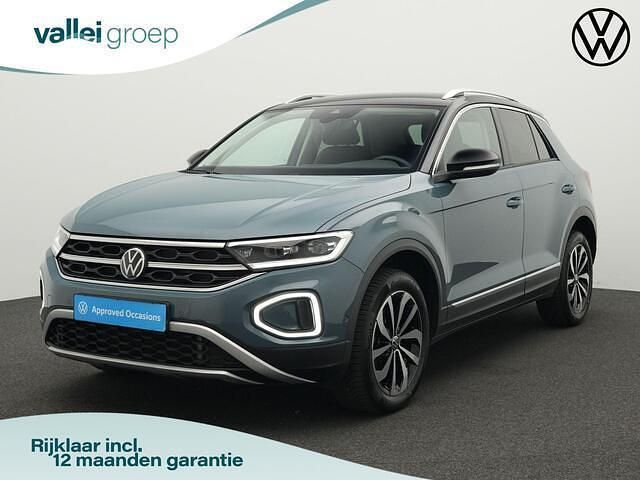 Blauw Gebruikt 2024 VW T-Roc Style SUV | € 32.400 (Eerlijke prijs) - Afbeelding 1/4