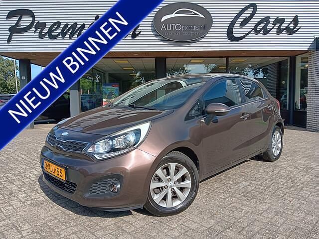 Bruin Gebruikt 2013 Kia Rio Plus Hatchback | € 10.925 (Eerlijke prijs) - Afbeelding 1/4