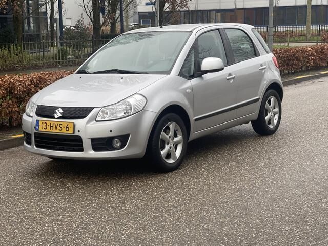 Grijs Gebruikt 2009 Suzuki SX4 Exclusive MPV | € 6.450 (Eerlijke prijs) - Afbeelding 1/4