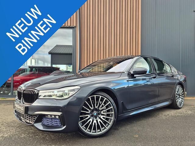 Grijs Gebruikt 2015 BMW 750 Executive Sedan | € 32.999 - Afbeelding 1/4