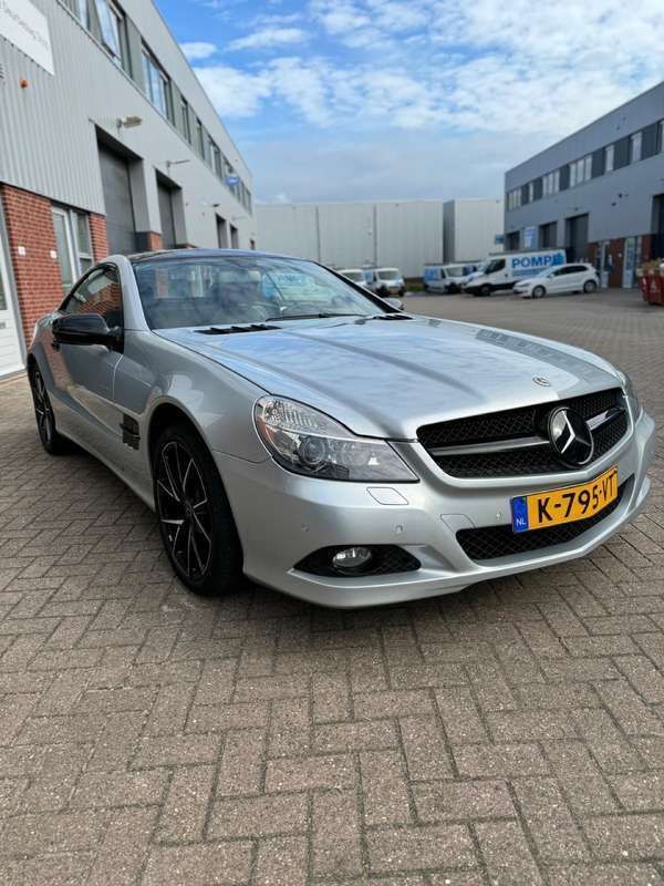 Grijs Gebruikt 2009 Mercedes SL500 Cabriolet | € 29.500 - Afbeelding 1/4