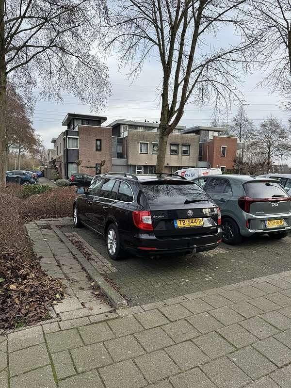 Occasion Skoda Superb Ambition 105 PK (77 kW) 2014 Zwart Stationwagen