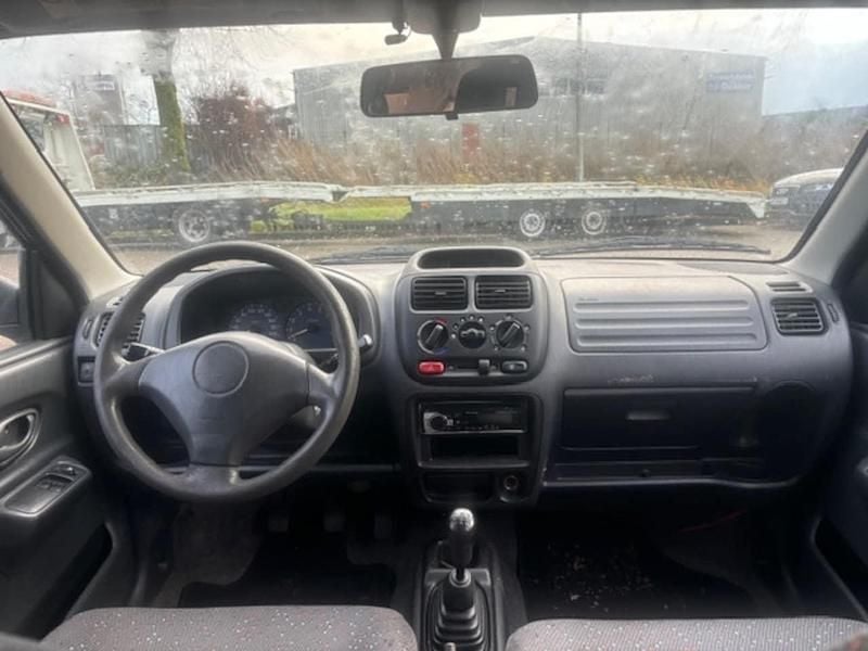 Grijs (metallic) Gebruikt 2003 Suzuki Ignis Limited Hatchback | € 1.099 - Afbeelding 1/4