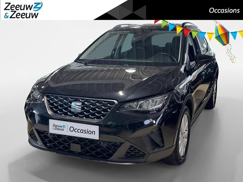 Metallic mythical black (0e) Gebruikt 2023 Seat Arona Business SUV | € 16.945 (Super prijs) - Afbeelding 1/4