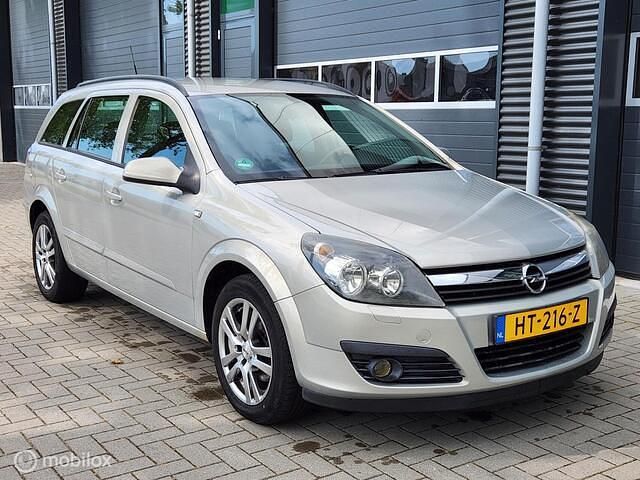 Grijs Gebruikt 2006 Opel Astra Essentia Stationwagen | € 2.250 (Eerlijke prijs) - Afbeelding 1/4