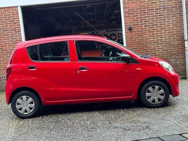 Occasion Daihatsu Cuore 69 PK (50 kW) 2010 Rood Hatchback