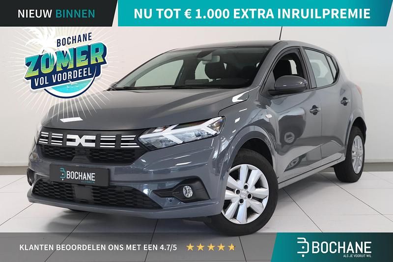 Grijs Gebruikt 2024 Dacia Sandero Expression Hatchback | € 18.235 (Goede deal) - Afbeelding 1/4
