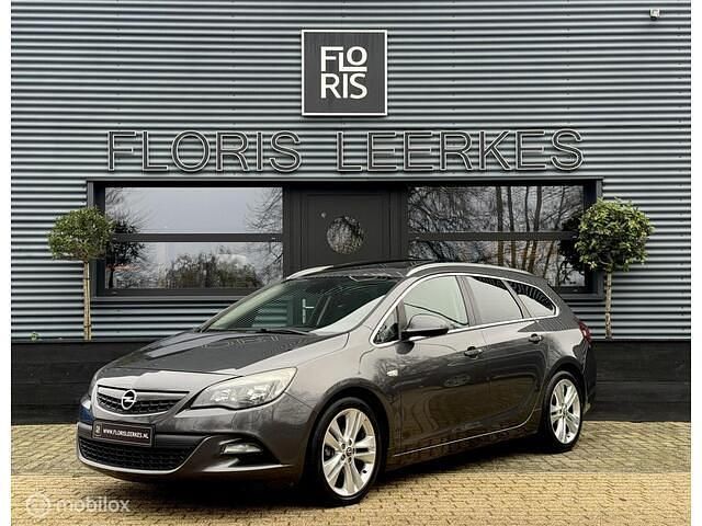 Grijs Gebruikt 2012 Opel Astra Sport Stationwagen | € 4.450 (Duur) - Afbeelding 1/4