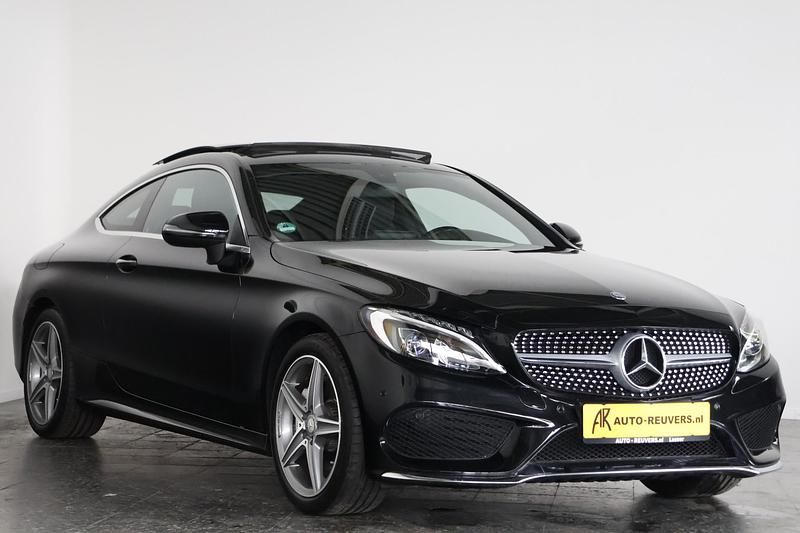 Occasion Mercedes C180 AMG line 156 PK (114 kW) 2016 Zwart Coupé