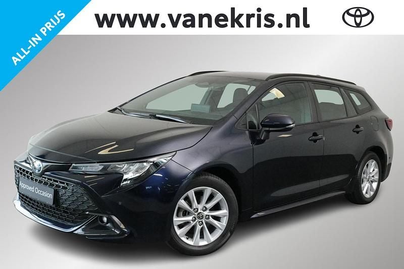 Blauw Gebruikt 2025 Toyota Corolla Hybrid Stationwagen | € 31.499 - Afbeelding 1/4