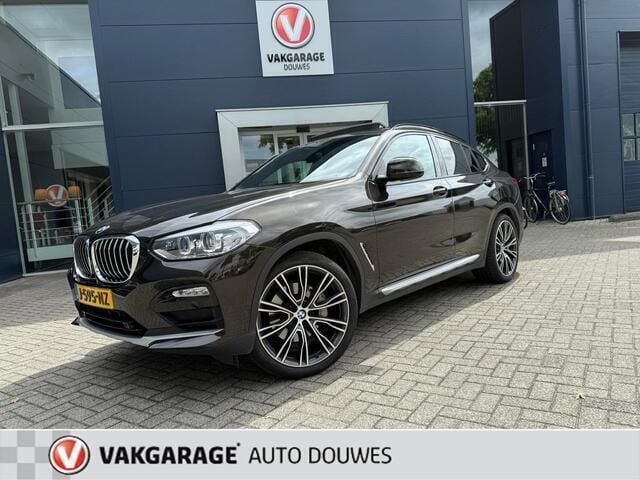 Bruin, metallic lak Gebruikt 2019 BMW X4 Executive SUV | € 42.950 (Goede deal) - Afbeelding 1/4