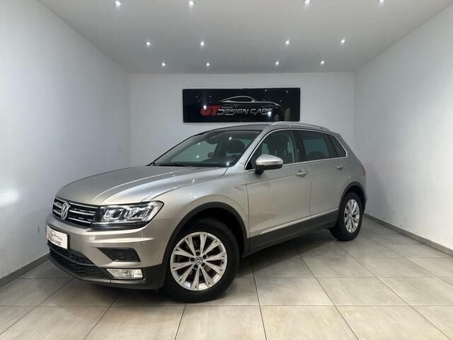 Grijs Gebruikt 2017 VW Tiguan SUV | € 17.999 (Goede deal) - Afbeelding 1/4