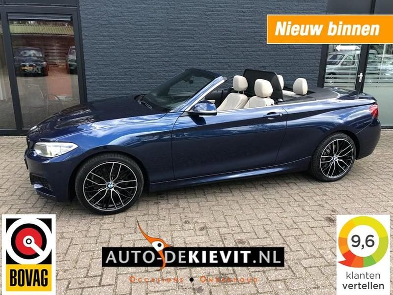 Blauw, metallic lak Occasion 2016 BMW 228 M Sport Cabriolet | € 28.899 - Afbeelding 1/4