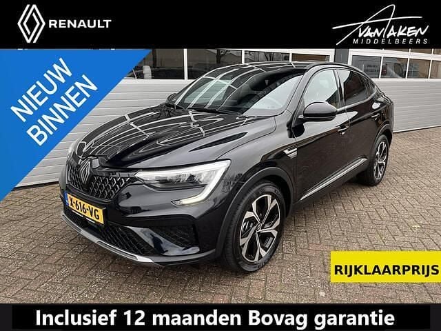 Black metallic (tegxa) Gebruikt 2024 Renault Arkana Techno SUV | € 25.950 (Goede deal) - Afbeelding 1/4