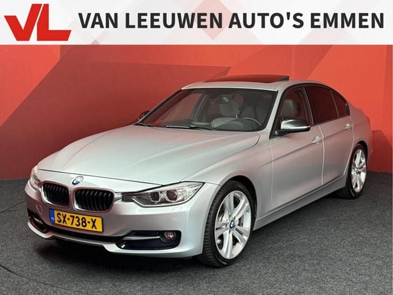 Grijs Gebruikt 2012 BMW 335 Executive Sedan | € 19.900 (Eerlijke prijs) - Afbeelding 1/4