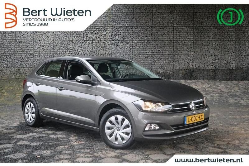 Grijs Gebruikt 2021 VW Polo Comfortline Hatchback | € 21.135 (Eerlijke prijs) - Afbeelding 1/3