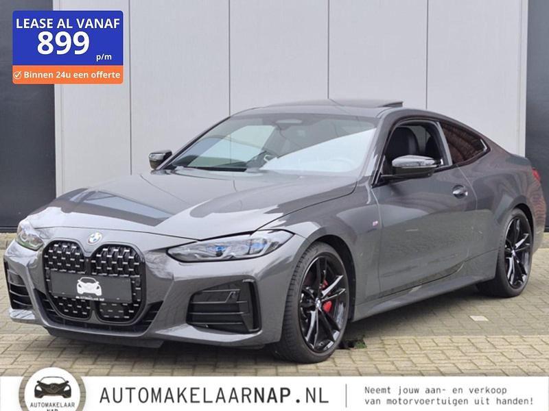 Grijs Occasion 2022 BMW M440 Executive Sedan | € 52.840 (Super prijs) - Afbeelding 1/4
