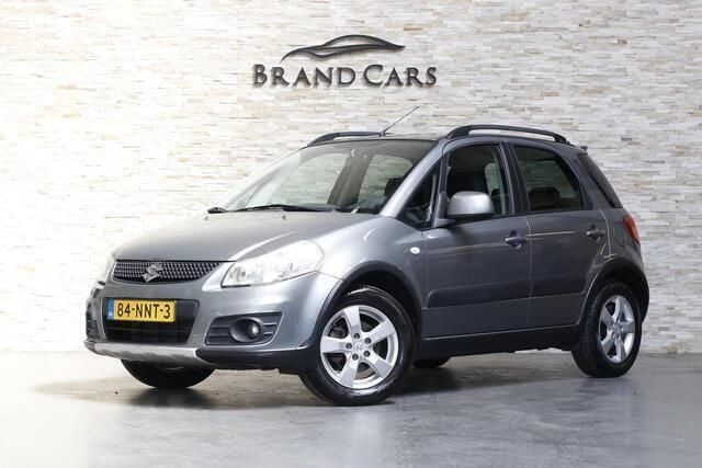 Grijs Gebruikt 2010 Suzuki SX4 Exclusive MPV | € 8.450 (Eerlijke prijs) - Afbeelding 1/4