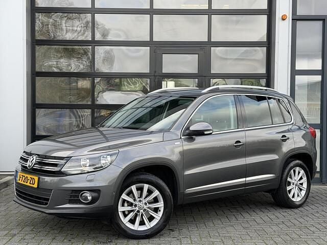 Grijs Gebruikt 2013 VW Tiguan Life SUV | € 10.995 (Eerlijke prijs) - Afbeelding 1/4