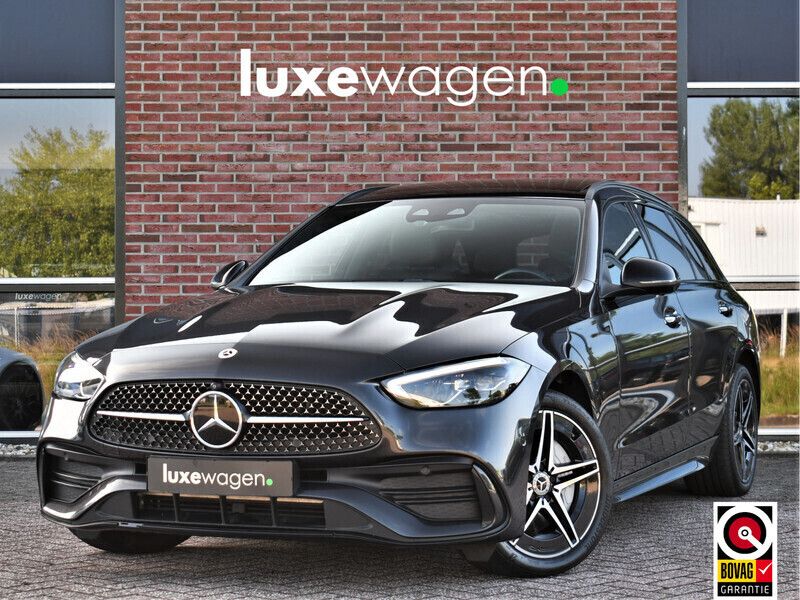 Grijs Gebruikt 2022 Mercedes E300 AMG Stationwagen | € 39.900 (Eerlijke prijs) - Afbeelding 1/4